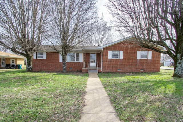 ranch-style house featuring a front lawn