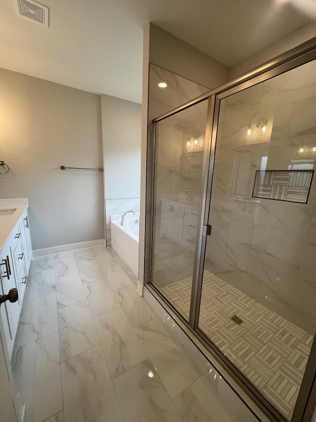 bathroom with vanity and plus walk in shower