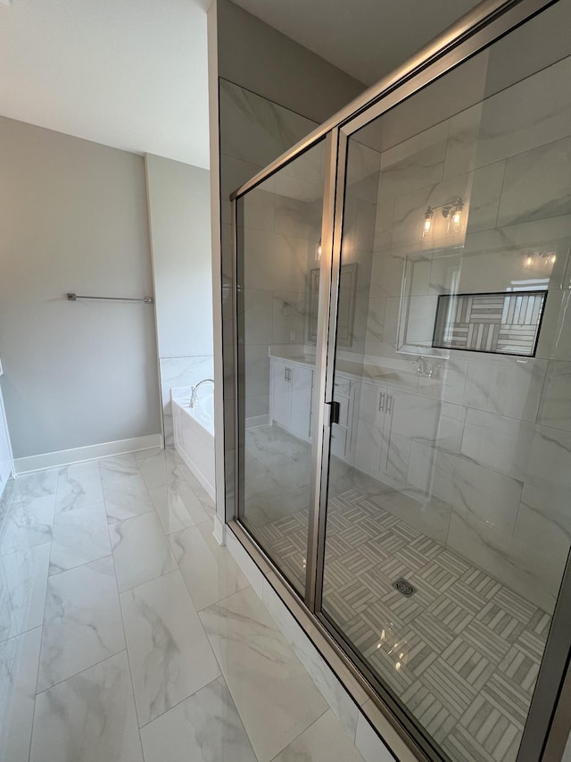 bathroom with independent shower and bath