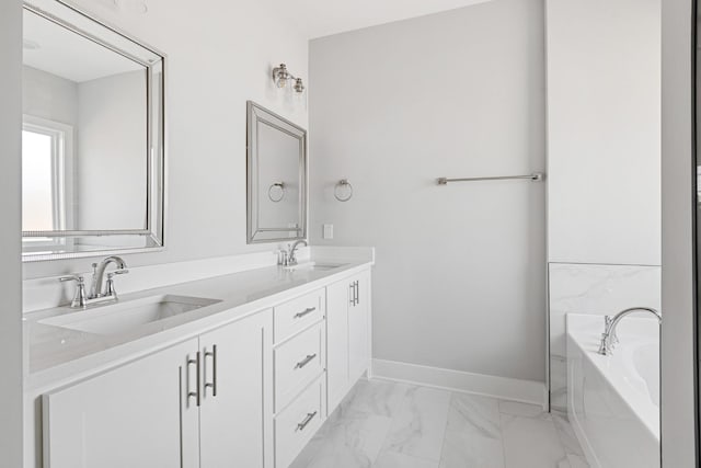 bathroom featuring a bathing tub and vanity