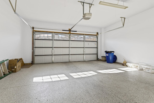 garage featuring a garage door opener