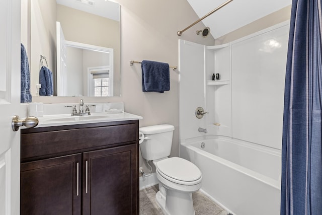 full bathroom featuring vanity, vaulted ceiling, shower / bath combo with shower curtain, and toilet