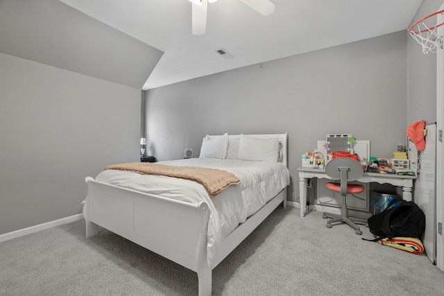 carpeted bedroom featuring ceiling fan and lofted ceiling