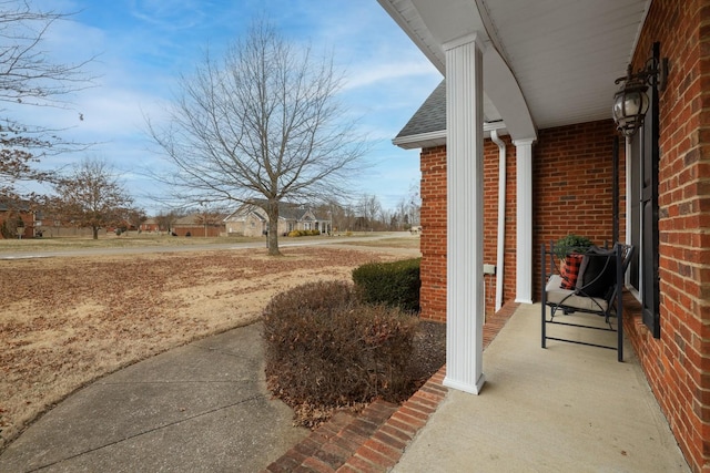 view of patio featuring a porch