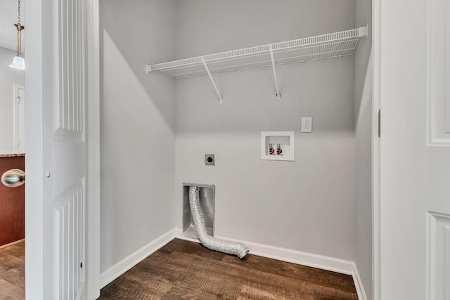 clothes washing area with hookup for a washing machine, hardwood / wood-style floors, and hookup for an electric dryer