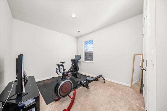 workout area with light colored carpet