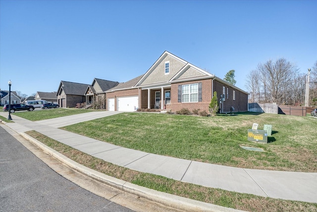 view of front of house featuring a front yard and a garage