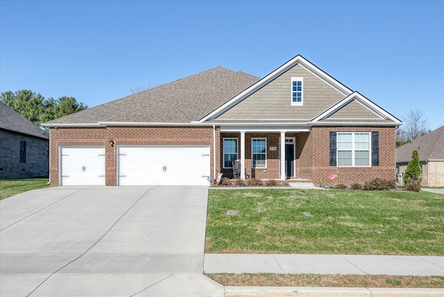 craftsman-style house with a front yard and a garage