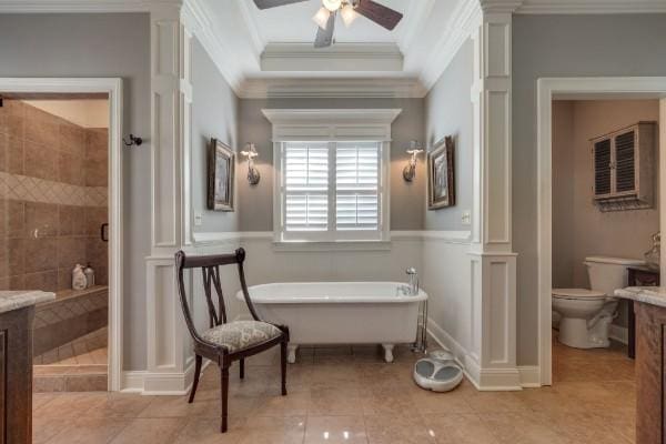 full bathroom with toilet, separate shower and tub, vanity, and decorative columns