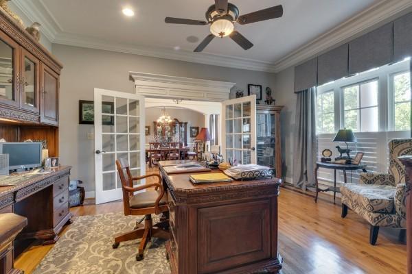 office area featuring ceiling fan with notable chandelier, ornamental molding, light hardwood / wood-style floors, and french doors