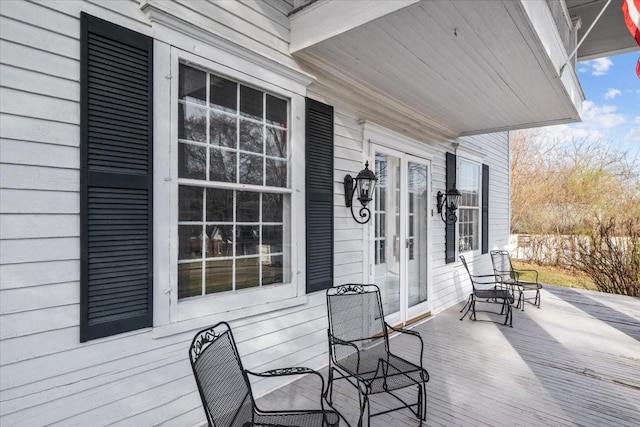 wooden terrace with covered porch