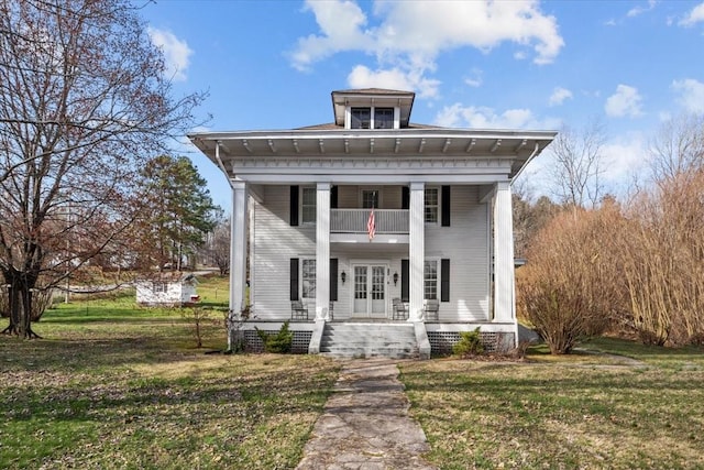 neoclassical / greek revival house with a balcony, a front lawn, and a porch