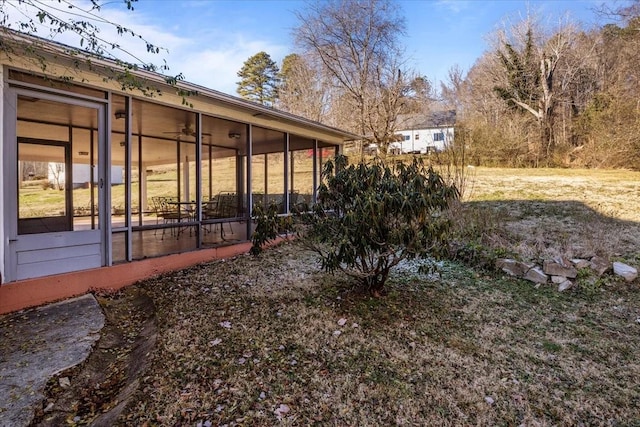 view of yard with a sunroom