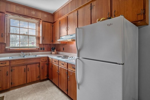 kitchen featuring sink and white appliances