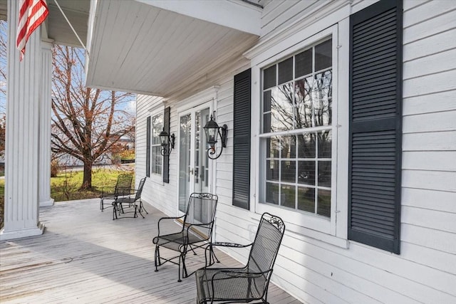 wooden deck with a porch