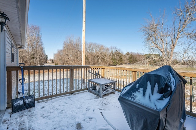 deck featuring a grill