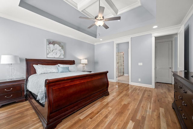 bedroom with ensuite bathroom, ornamental molding, coffered ceiling, ceiling fan, and light hardwood / wood-style floors