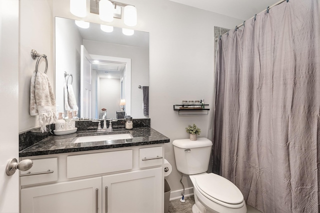 bathroom with toilet, a shower with shower curtain, and vanity