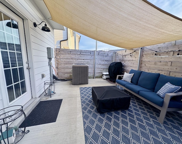 view of patio featuring central AC unit, outdoor lounge area, and a grill