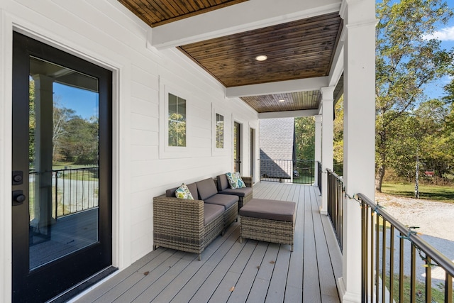 deck with an outdoor hangout area