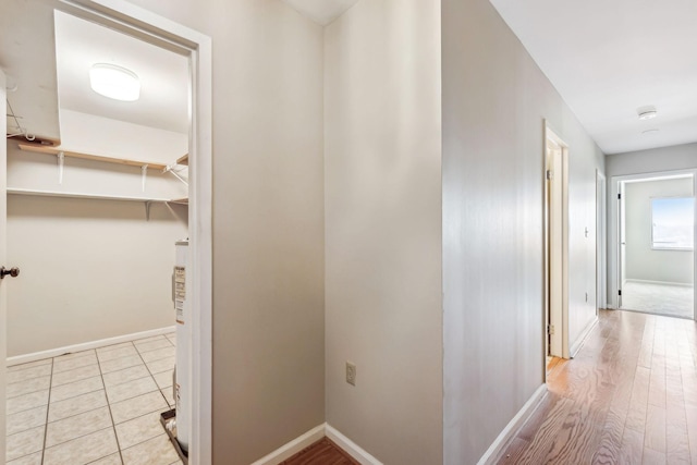 hall with light hardwood / wood-style flooring