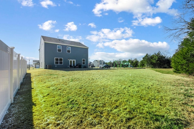 view of yard with central AC