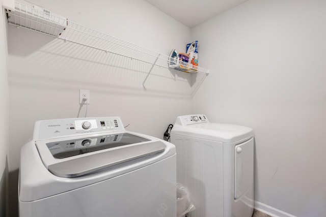 laundry area featuring independent washer and dryer