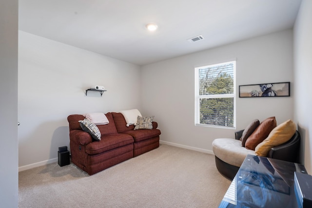 living room with light colored carpet