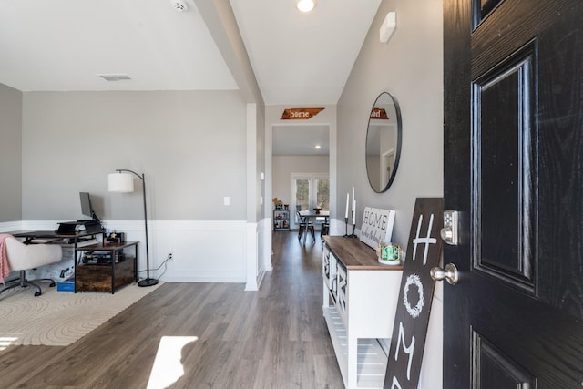 entrance foyer featuring hardwood / wood-style floors