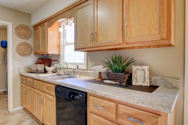 kitchen with sink, light tile patterned flooring, black dishwasher, and light brown cabinets