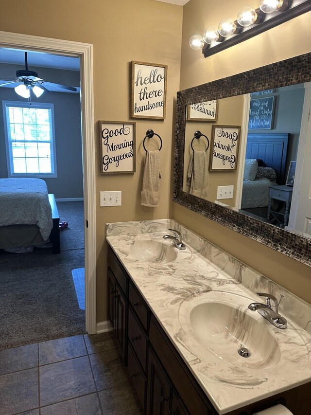 bathroom featuring vanity and ceiling fan