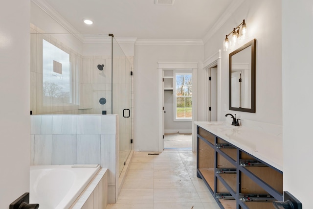 bathroom with vanity, crown molding, independent shower and bath, and tile patterned flooring