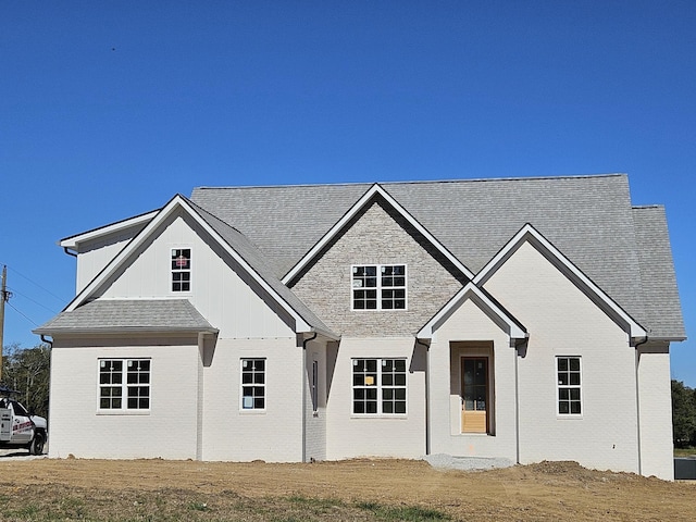 view of front of home with a front lawn