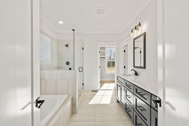 full bath featuring a garden tub, crown molding, vanity, and a shower stall