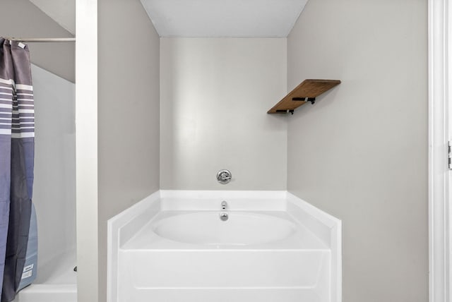 bathroom with shower with separate bathtub