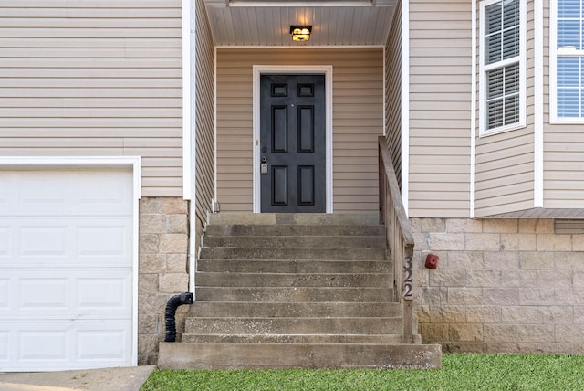 property entrance featuring a garage