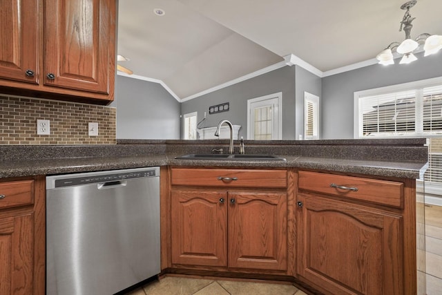 kitchen featuring kitchen peninsula, dishwasher, sink, ornamental molding, and lofted ceiling