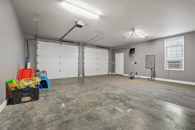 garage with a garage door opener and cooling unit