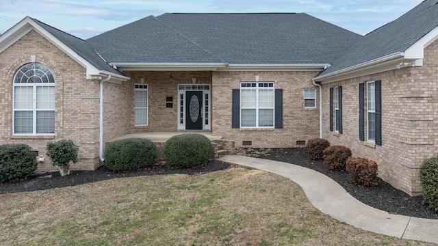 view of front of property with a front lawn