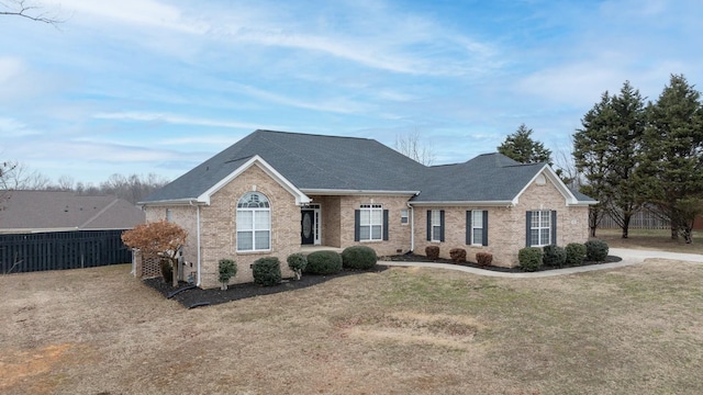 view of front of home with a front lawn