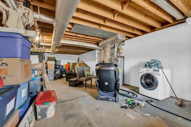 basement featuring washer / clothes dryer and water heater