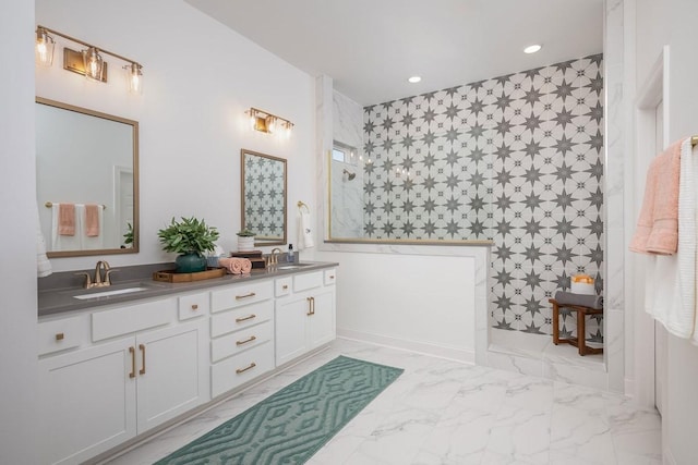 bathroom featuring vanity and a tile shower