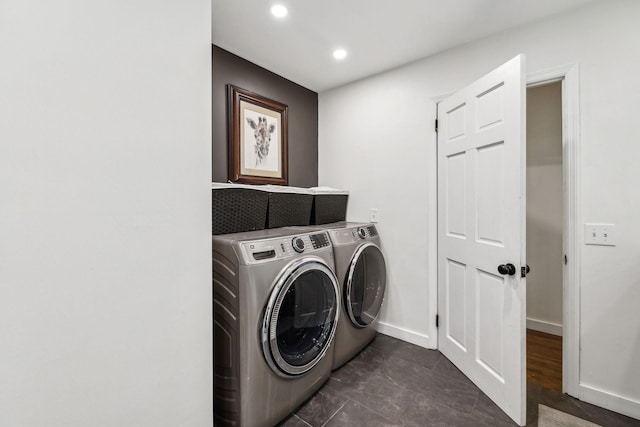 laundry room featuring separate washer and dryer