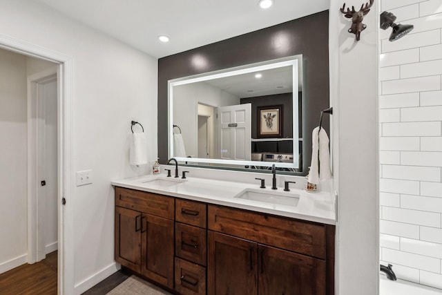 bathroom featuring vanity and wood-type flooring