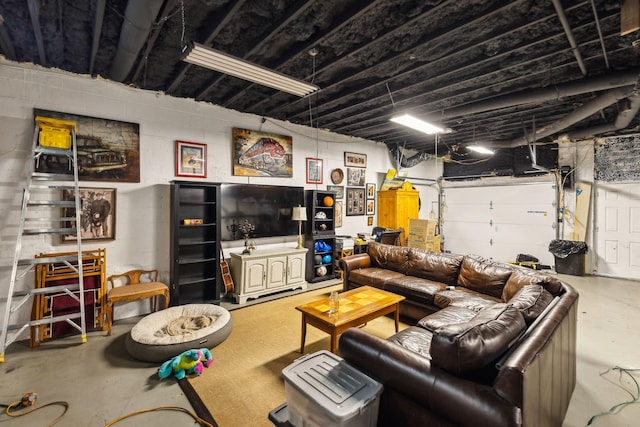 living room with concrete flooring