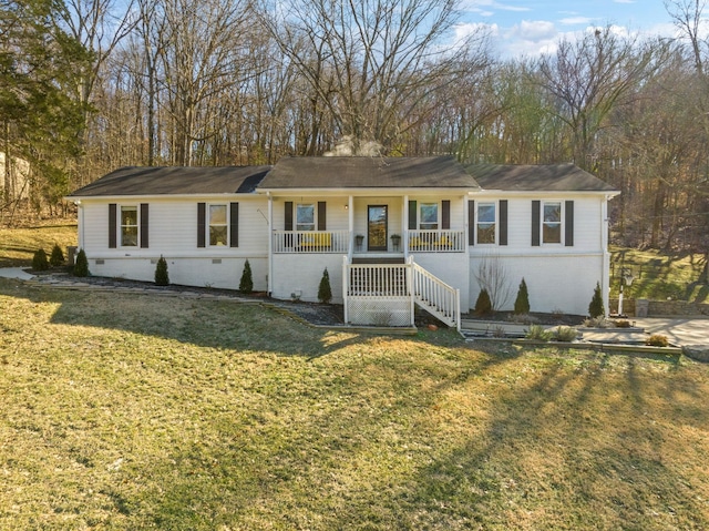 ranch-style house with a front lawn and covered porch