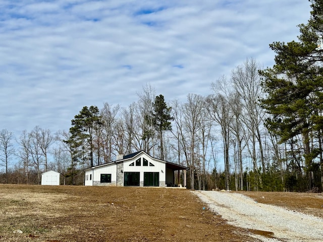 exterior space featuring an outbuilding