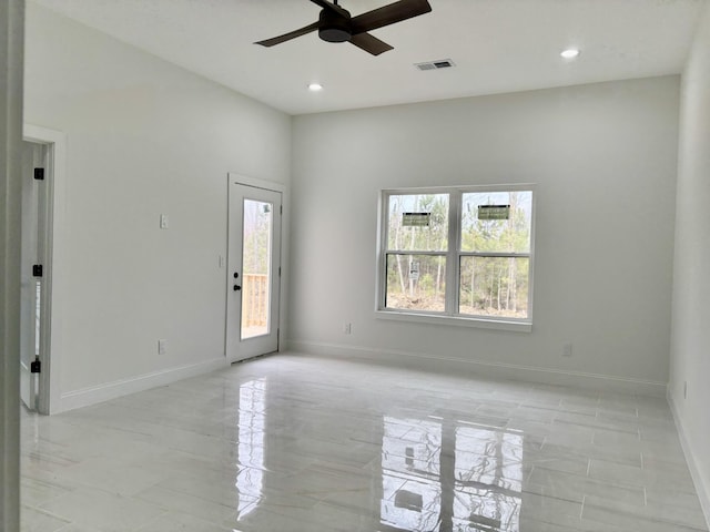 empty room featuring ceiling fan