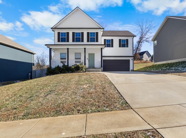 view of front of home with a porch, a garage, and a front lawn