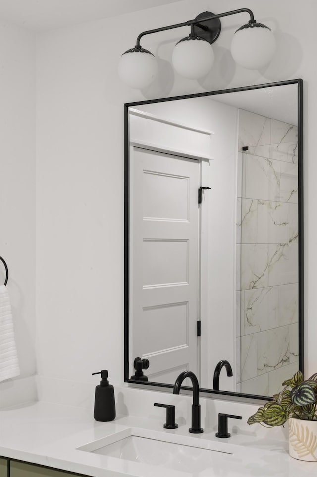 bathroom with vanity and walk in shower